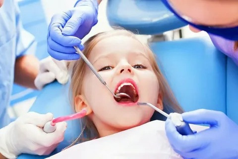 Restorative dental tools used in pediatric dentistry at Montclair clinic